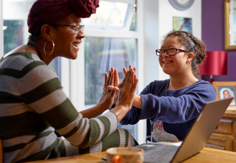 woman playing with a kid