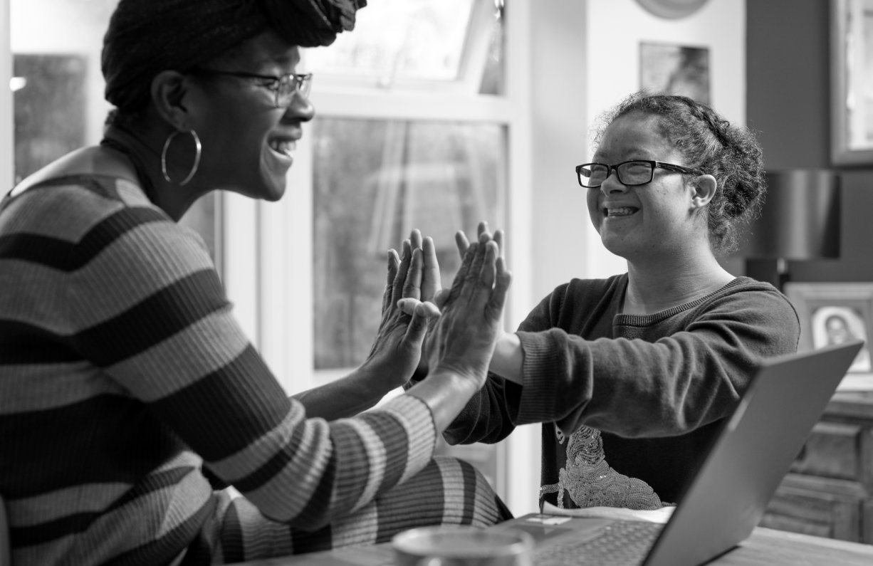 woman playing with a kid